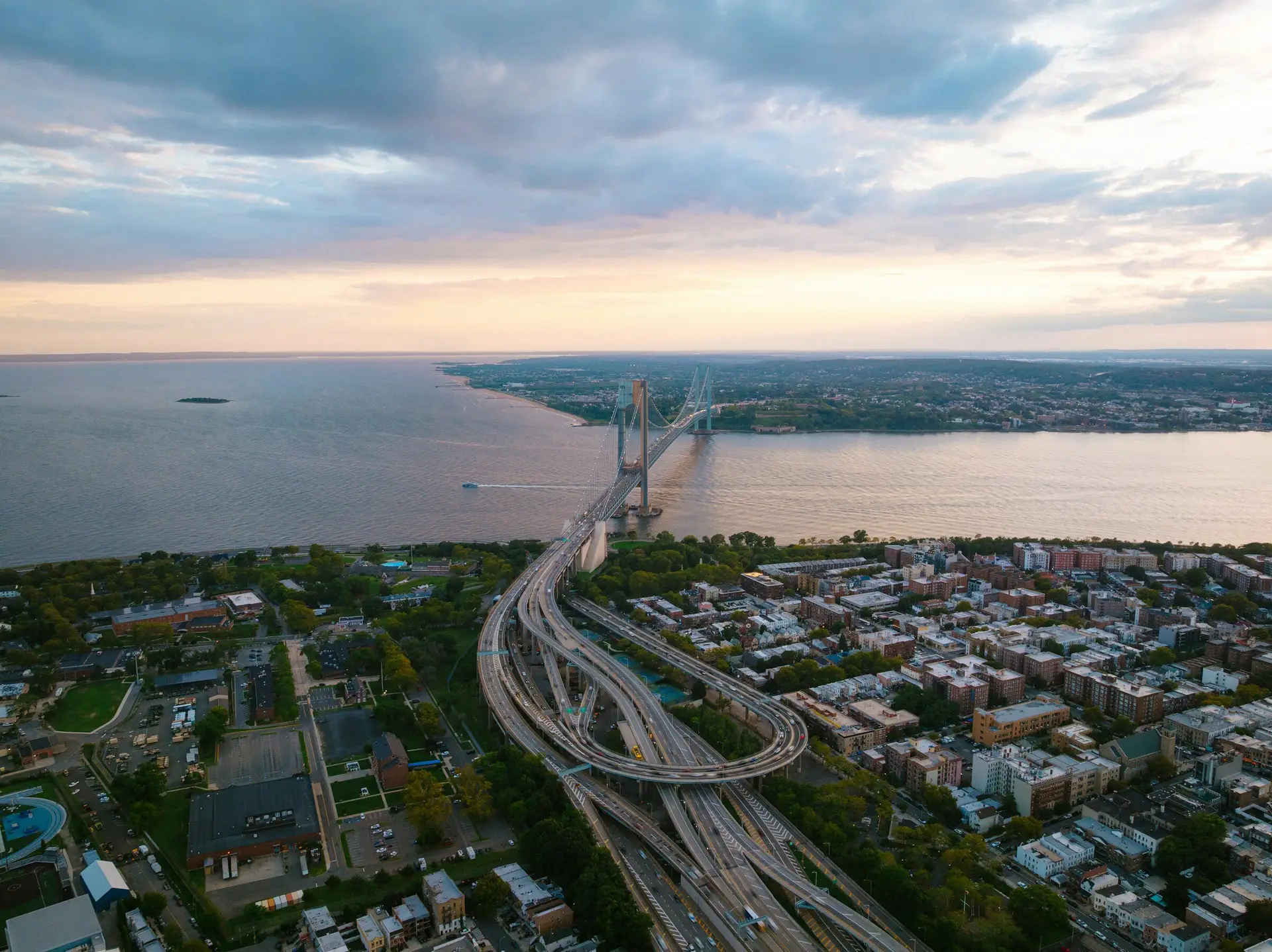 Aerial view of Bay Ridge, Brooklyn, and the Verrazzano-Narrows Bridge at dusk