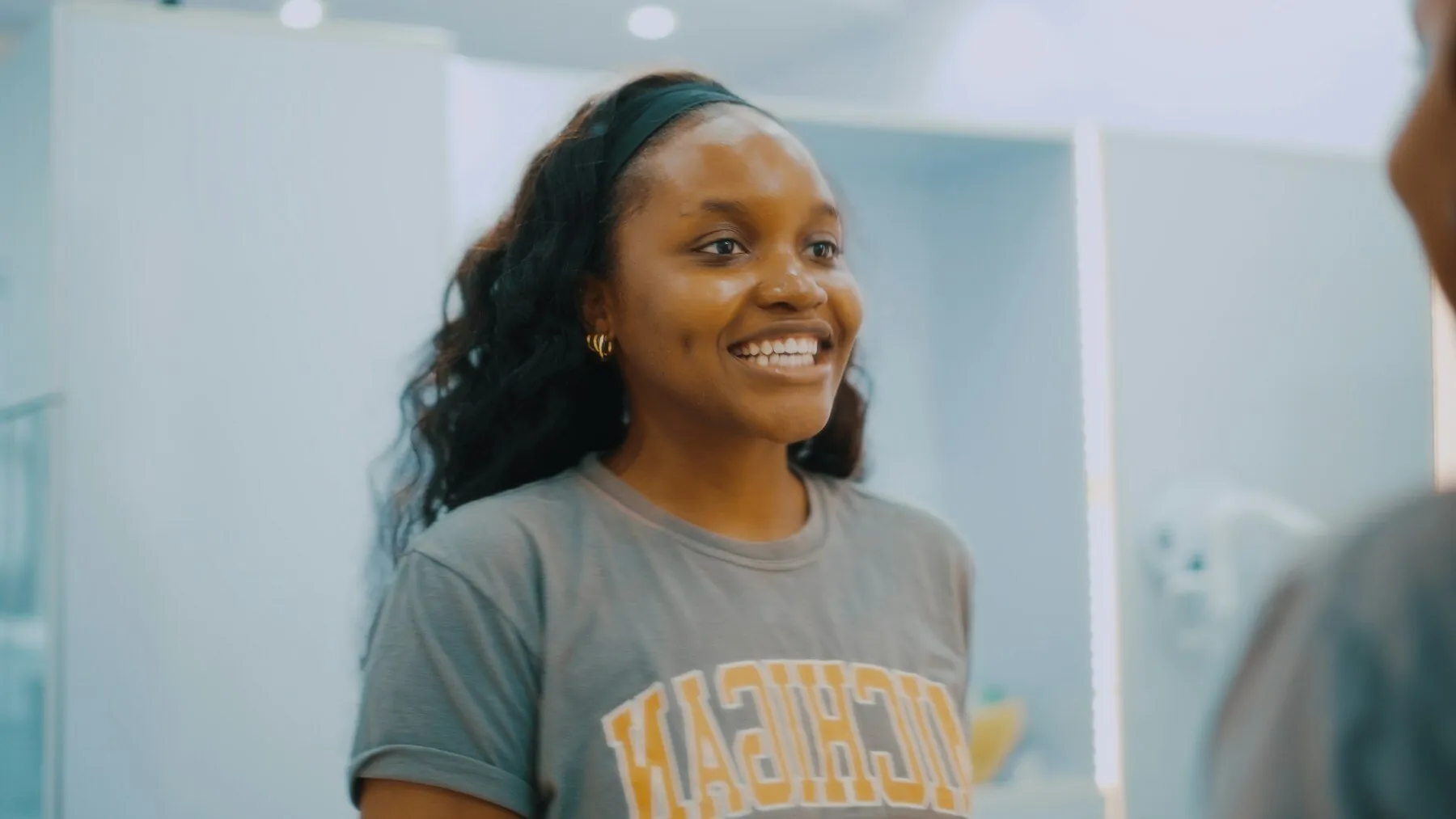 Young woman smiling at her orthodontic appointment