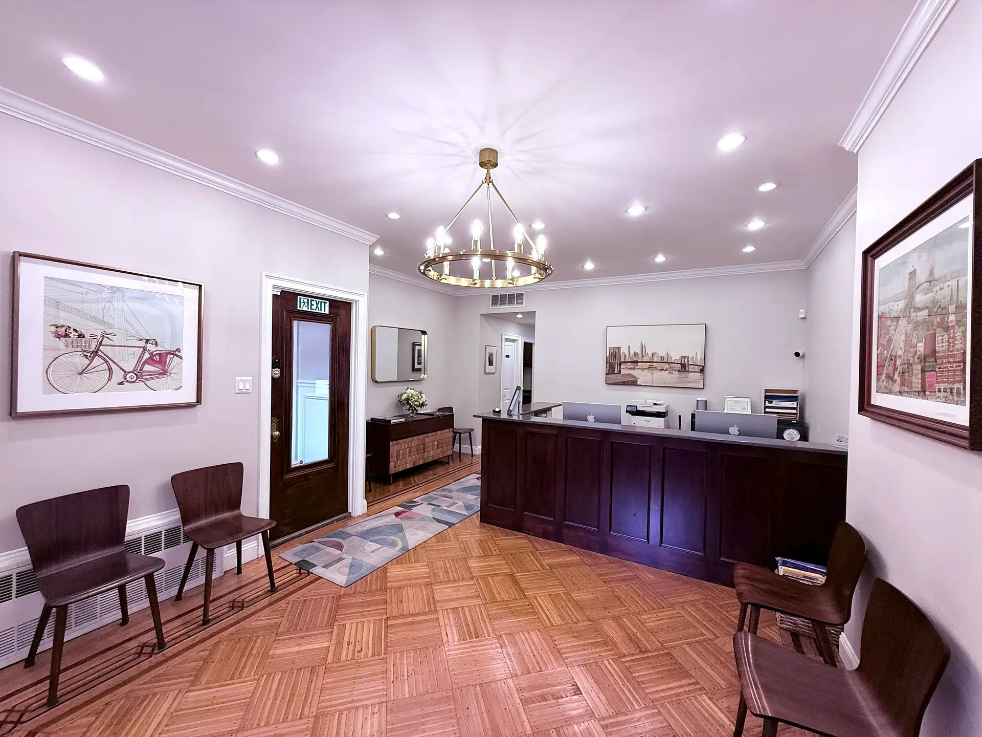 Renovated waiting room and front desk at Costalos Orthodontics in Bay Ridge